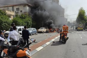 Falls reported in central Israel after an Iranian missile attack on April 4, 2026.