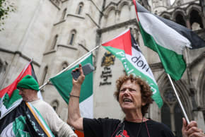 People gather outside London's High Court in London, Britain, July 30, 2025.