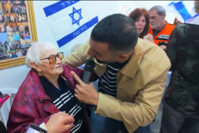 105-year-old Holocaust survivor Miriam celebrates her birthday with singer Regev Hot in a bomb shelter in Haifa in March 2026. 