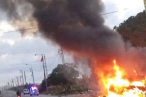 A vehicle can be seen burning in the Tyre District, southern Lebanon, April 8, 2026.
