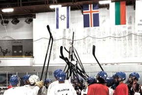 Team Israel gathers on the ice at their last practice before the tournament. 
