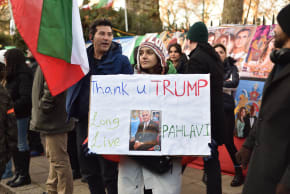 A protester holds up a placard. Iranian Embassy Protest in London UK. Regime change in Iran. January 3, 2026.
