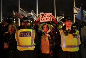 PEOPLE ATTEND a vigil organised by the Campaign Against Antisemitism and Chabad UK to honour victims of the Bondi attack in Sydney and mark the second night of Hanukkah, in London, Britain, December 15, 2025.