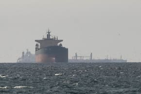 Cargo ships in the Gulf, near the Strait of Hormuz, as seen from northern Ras al-Khaimah, near the border with Oman’s Musandam governance, amid the US-Israeli conflict with Iran, in United Arab Emirates, March 11, 2026.