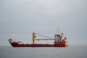 A vessel at the Strait of Hormuz, off the coast of Oman’s Musandam province, April 12, 2026.