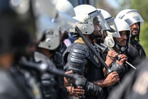 Riot policemen line up along a road near the expected venue of the US-Iran talks in the Red Zone area of Islamabad on April 10, 2026. 