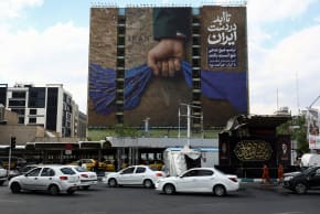 A billboard with a graphic design about the Strait of Hormuz on a building in Tehran, Iran, April 13, 2026