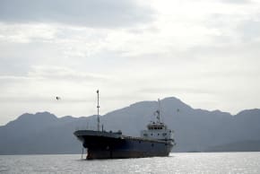 A vessel in the Strait of Hormuz, off the coast of Oman’s Musandam province, April 12, 2026.