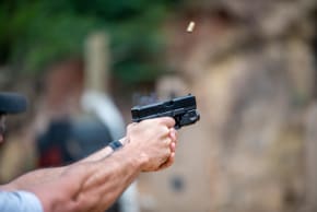 Man shooting with gun. (Illustrative)