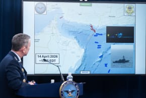 US Chairman of the Joint Chiefs of Staff General Dan Caine speaks as a map of the Strait of Hormuz is displayed during a press briefing at the Pentagon in Washington, DC, on April 16, 2026.