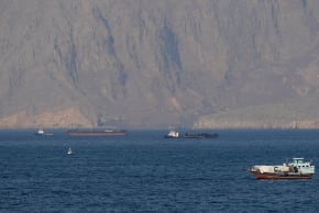 Ships and tankers in the Strait of Hormuz off the coast of Musandam, Oman, April 18, 2026. 