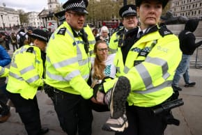 Police officers detain a protester at 'Everyone Day', a mass vigil and sign-holding event in Trafalgar Square organised by Defend Our Juries to demand the lifting of the ban on Palestine Action, in London, Britain, April 11, 2026.