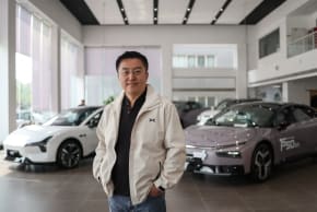 Vice Chairman and President of Chinese EV maker XPeng, Brian Gu, poses for pictures during an interview with Reuters before the Auto China show, at an XPeng dealership in Beijing, China, April 23, 2026.