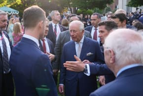 Britain’s King Charles III speaks with guests during a garden party at the British Embassy, Monday, April 27, 2026, in Washington, D.C. U.S. 