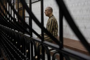 Atef Najib, a brigadier general and former head of the Political Security Department in Daraa during Syria's ousted President Bashar al-Assad's rule, who is accused of committing war crimes, attends a trial session at the Palace of Justice, in Damascus, Syria, April 26, 2026.