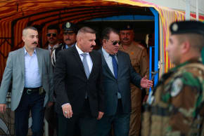 Iraqi Interior Minister Abdul Amir al-Shammari (C) arrives at the police club stadium in Baghdad on June 5, 2023, during the annual sports festival of the Iraqi Ministry of Interior.