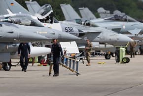 Combat aircrafts from a NATO country stand in front of a hangar during a fighter plane maneuver exercise at the American military's Ramstein Air Base, near Ramstein-Miesenbach, Germany, June 6, 2024.