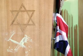 A SWASTIKA daubed on the pulpit of London’s Finsbury Park Synagogue, April 2002. 