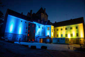 Picture taken on March 23, 2022 in Oslo shows the Holocaust Center on Bygdoy with it's building "Villa Grande" illuminated in the colors of Ukraine in support for the Ukrainian people.