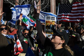 Iranian Americans wave flags and chant during a gathering of Iranian community members showing support for Israel and the United States, outside the Consulate General of Israel in Los Angeles, on March 5, 2026.