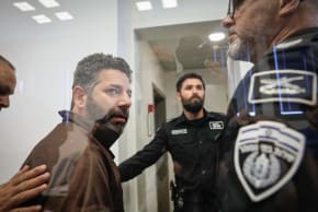 Saif Abu Keshek, who took part in a flotilla to the Gaza Strip, arrives for a remand hearing at the Magistrate's Court in Ashkelon.
