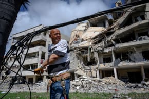 Lebanese electrical workers rebuild damaged power lines, as families return to apartments wrecked by Israeli strikes in Tyre last month. Some Lebanese citizens believe Hezbollah’s concept of resistance has completely failed. 