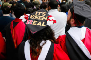 Graduates and guests of Rutgers University graduation exit the ceremonies