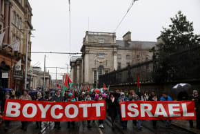 (ILLUSTRATIVE) DEMONSTRATORS HOLD banners in support of Palestinians during a protest in relation to the ceasefire in Gaza, in Dublin, Ireland, February 21, 2026.