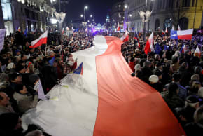 People gather in front of the Presidential Palace during a protest against judicial reforms in Warsaw, Poland, November 24, 2017.