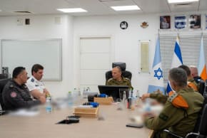 HOME FRONT Command chief Shay Klepper meets with representatives from Israel's emergency services.