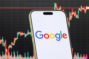In this photo illustration, a smartphone displays the logo of Google.