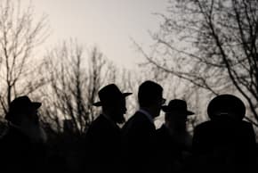Rabbis from across Europe gather for a group photo at the Brandenburg Gate on March 10, 2026 in Berlin, Germany.