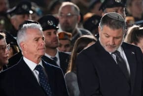 Mossad chief David Barnea (L) and Shin Bet chief David Zini at a Memorial Day ceremony at the Western Wall, in Jerusalem's Old City, April 20, 2026.