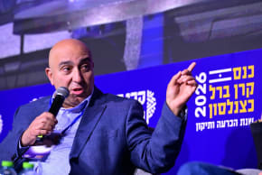 Samer Sinijlawi is seen speaking at the annual Berl Katznelson Foundation conference in Tel Aviv, in 2026. 