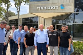 Yisrael Beytenu leader MK Avigdor Liberman and members of his party at a tour in Kibbutz Be'eri, Thursday, May 14, 2026.