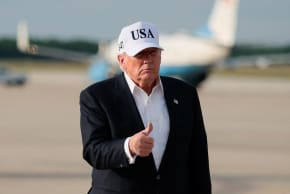 US President Donald Trump gives a thumbs up after disembarking Air Force One following his trip to China at Joint Base Andrews, Maryland, US, May 15, 2026.