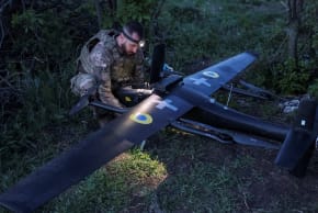 A Ukrainian serviceman from the special police unit Hyzhak prepares a Gara, a Ukrainian multifunctional unmanned aerial vehicle equipped with artificial intelligence elements, before flying it over positions of Russian troops, amid Russia's attack on Ukraine, near the frontline in Donetsk.