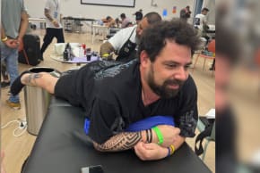 Gal Bilboa-Dalal receives first tattoo from Healing Ink based on the secret message from his brother Guy Bilboa-Dalal carried out of Gaza by a freed hostage. 