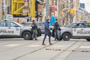 Toronto police stand watch near the Al-Quds day protest in Toronto, Ontario, on March 14, 2026.