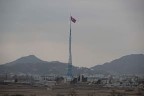 North Korean propaganda village "Gijungdong" is seen from an South Korea's observation post inside the JSA during a media tour at the Joint Security Area (JSA) on the Demilitarized Zone (DMZ) in the border village of Panmunjom in Paju, South Korea, 3 March 2023. 
