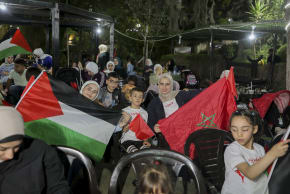 Palestinian Morocco fans gather for a public screening of the 2026 FIFA World Cup match between Morocco and Canada in Hebron, the occupied West Bank, on July 4, 2026. 
