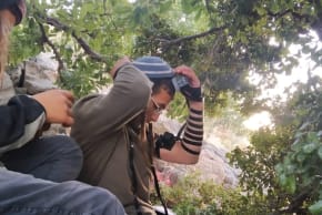 A member of the HaBashan Pioneers movement puts on tefillin on Mount Hermon, July 9, 2026.