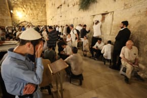 Jews pray at the Western Wall on Tisha B'Av, July 22, 2026.
