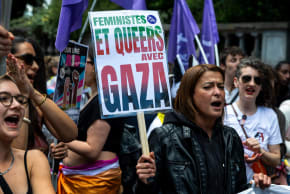 Protesters in France hold a sign that reads FEMINISTS AND QUEER PEOPLE STAND WITH GAZA during the 2026 Suburban Pride which took place in Aubervilliers in support of LGBTQ people in working class neighborhoods in June.