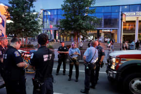 First responders gather after reports of a stabbing incident at Penn Station in New York City