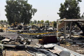 Damage at a site belonging to Iraq's Popular Mobilization Forces (PMF) following airstrikes that the PMF said were carried out by US and Saudi forces, in Bartella, Nineveh province, Iraq, July 29, 2026. Picture taken with a mobile phone.