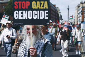A MAN carries a placard during a pro-Palestinian rally calling on Britain’s incoming prime minister, Andy Burnham, to stand up for Gazans, in London earlier this month.