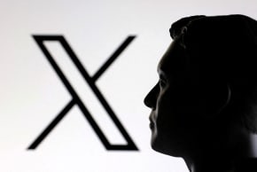 A 3D-printed miniature model of Elon Musk and the X logo are seen in this illustration taken January 23, 2025. 
