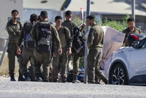 Israeli soldiers are seen outside the Sde Teiman military base near Beersheba, southern Israel, July 30, 2026. (photo credit: Tsafrir Abayov/Flash90)