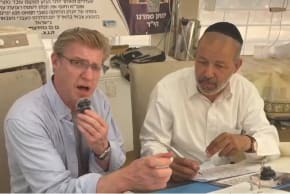 Rabbi Mark Wildes with the scribe at the Nova site.